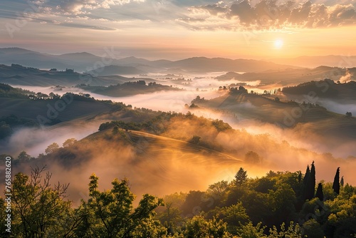 Tuscany landscape at sunrise with low fog