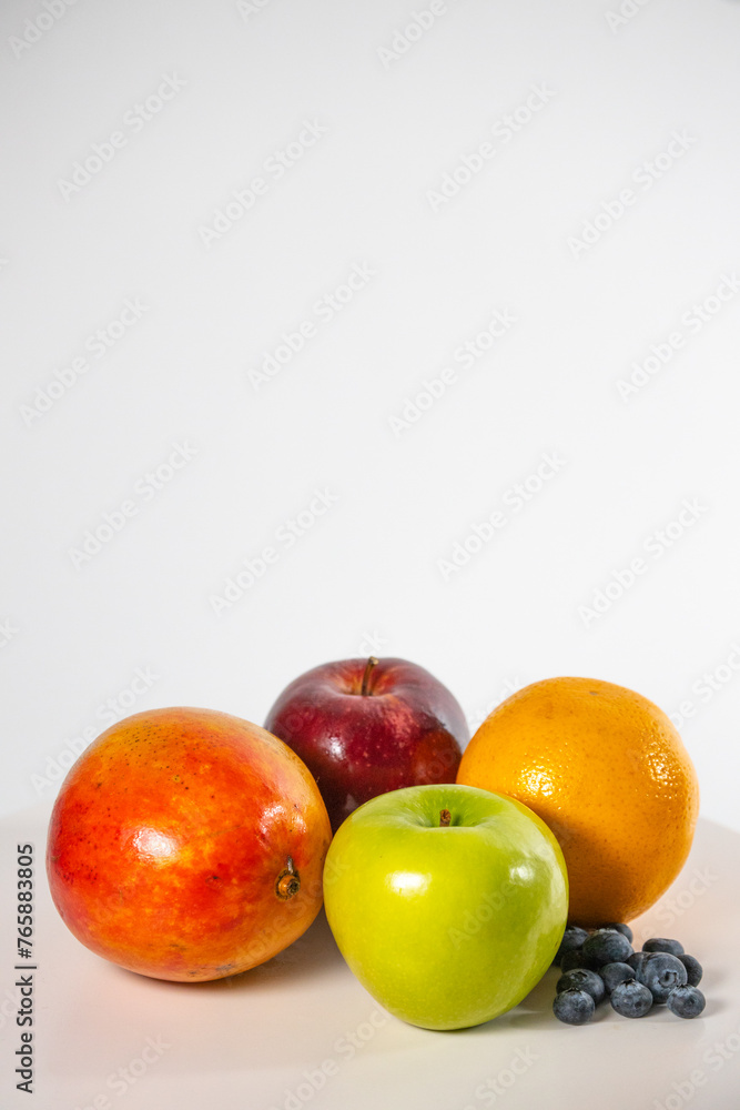 Healthy fresh fruits on white background