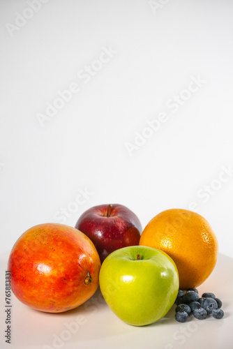Healthy fresh fruits on white background