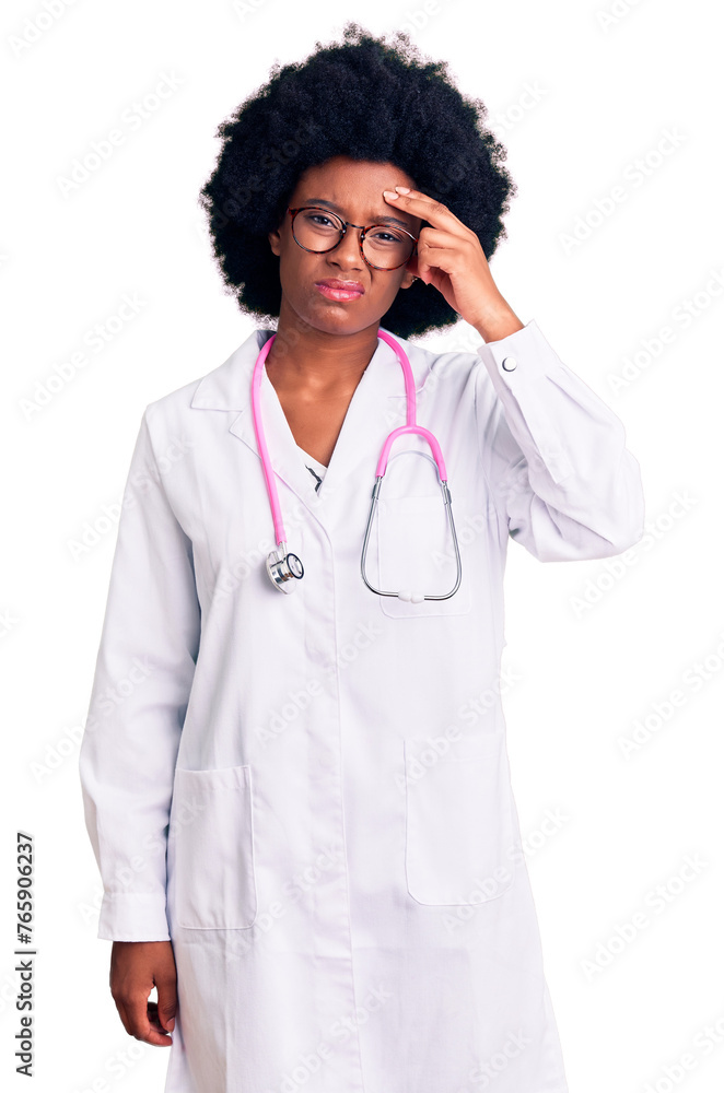 Young african american woman wearing doctor coat and stethoscope worried and stressed about a problem with hand on forehead, nervous and anxious for crisis Young african american woman wearing doctor coat and stethoscope worried and stressed about a problem with hand on forehead, nervous and anxious for crisis