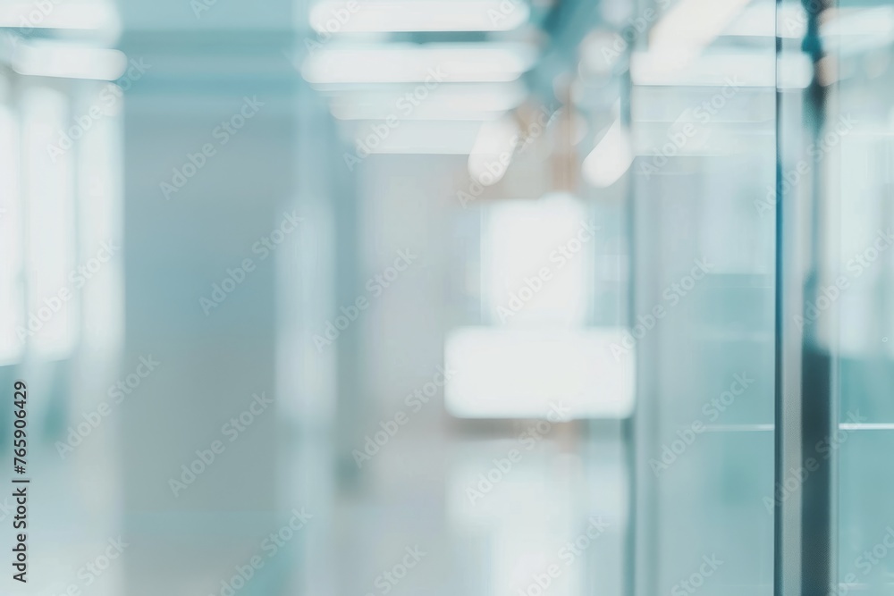 Blurred glass wall of modern business office building at the business center use for background in business concept. Blur corporate business office. Abstract windows with a blue tint Blurred glass wall of modern business office building at the business center use for background in business concept. Blur corporate business office. Abstract windows with a blue tint