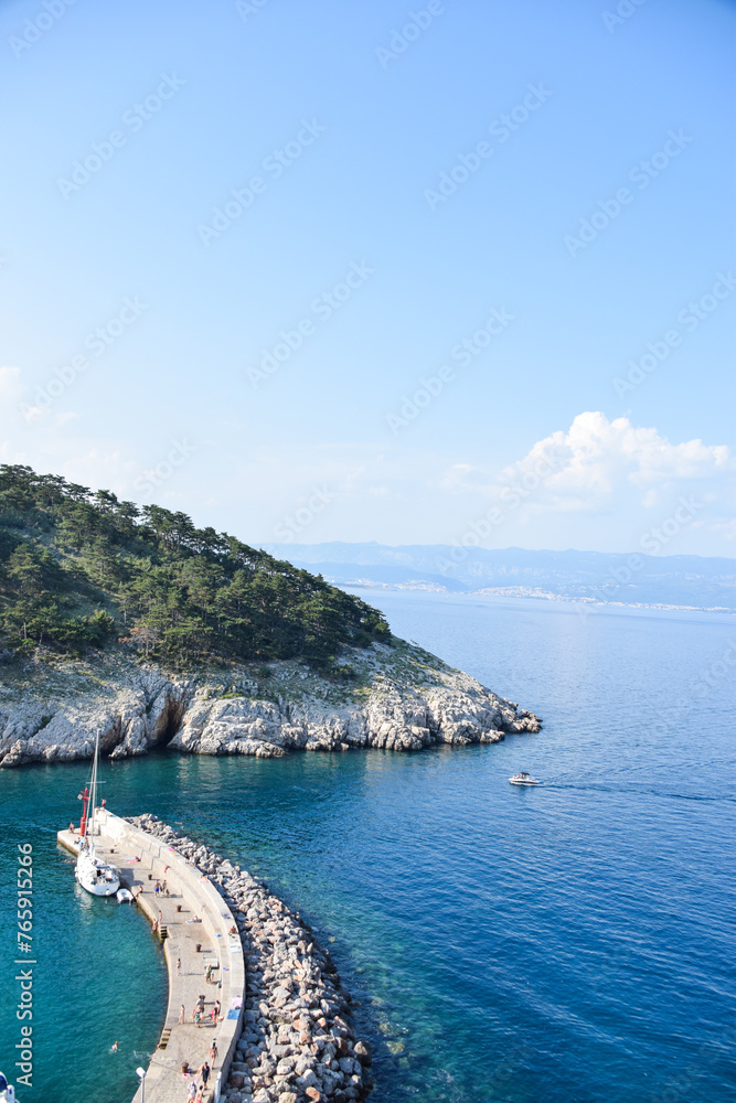 Beautiful rough blue sea with waves and sandy beach. Beautiful day in Greece	