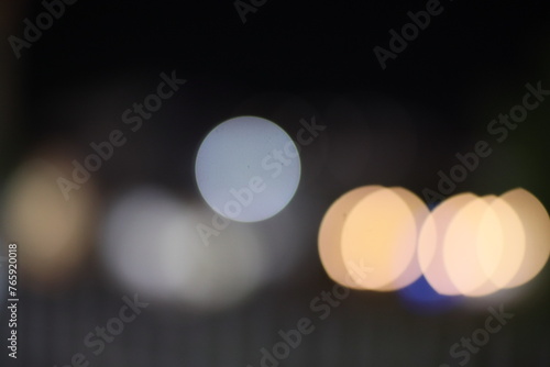 The bokeh circles from the garden lights are out of focus © RezaRio
