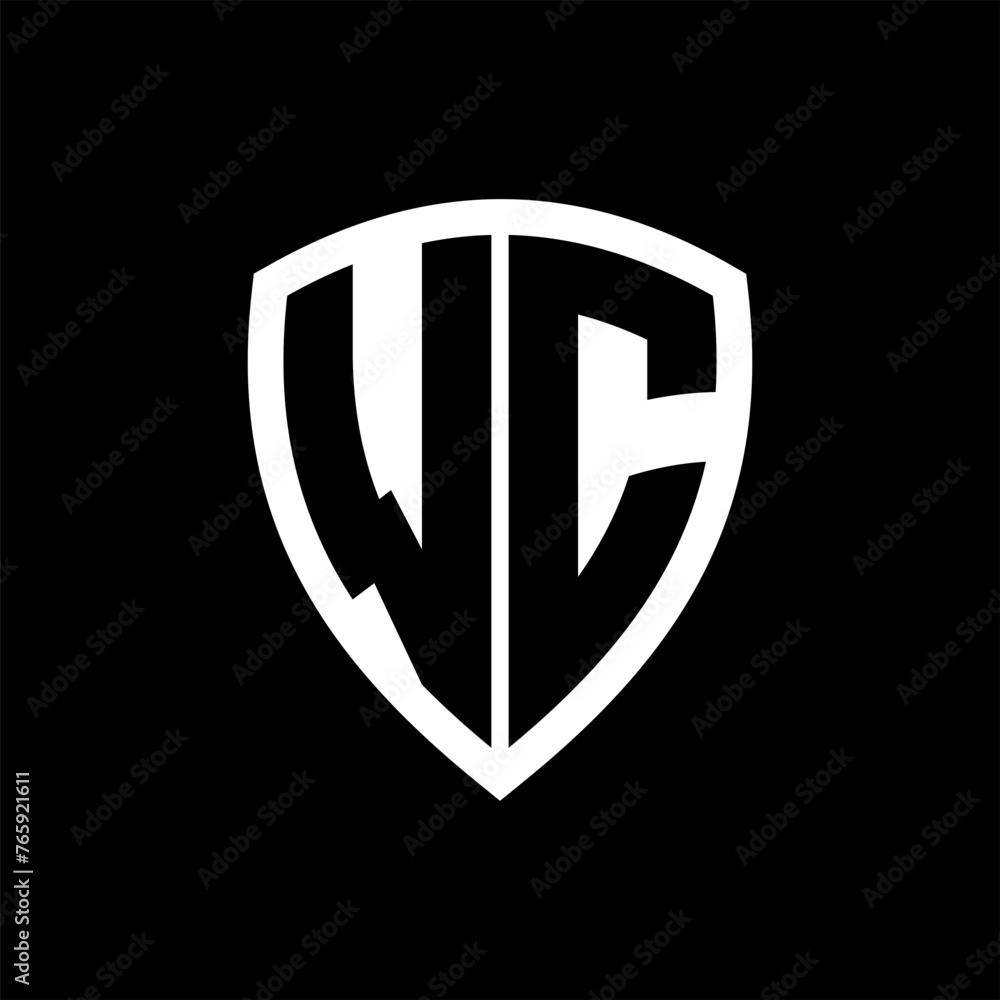 WC monogram logo with bold letters shield shape with black and white color design WC monogram logo with bold letters shield shape with black and white color design