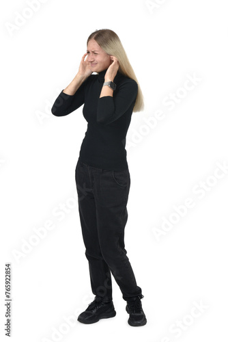 side view of woman covering her ears from noise on white background © curto