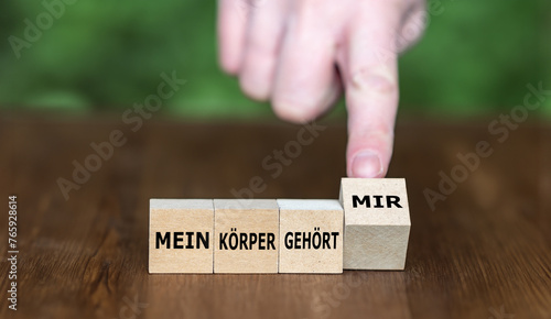 Wooden cubes form the German expression 'mein Koerper gehoert mir' (my body belongs to me).