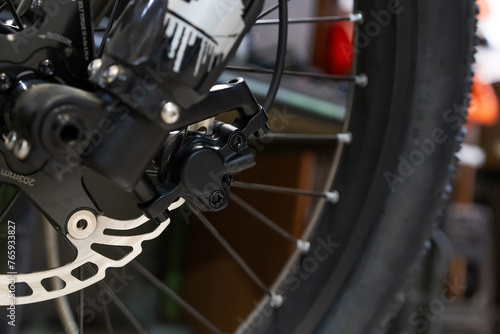 Bicycle front hydraulic disc brake caliper close up