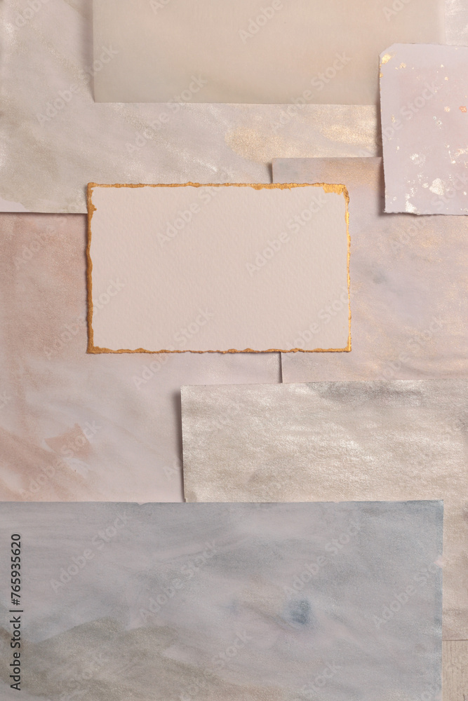 Fototapeta premium Beige and nacre gold frame painting paper empty card on painting wall. Abstract texture copy space neutral pastel background.