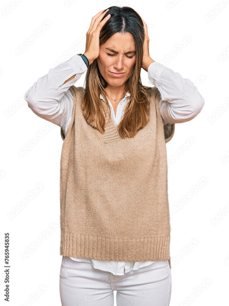 Young woman wearing casual clothes suffering from headache desperate and stressed because pain and migraine. hands on head. Young woman wearing casual clothes suffering from headache desperate and stressed because pain and migraine. hands on head.