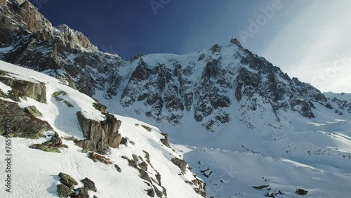 Sharp Snowy Peaks Of French Alps Rising Drone Shot