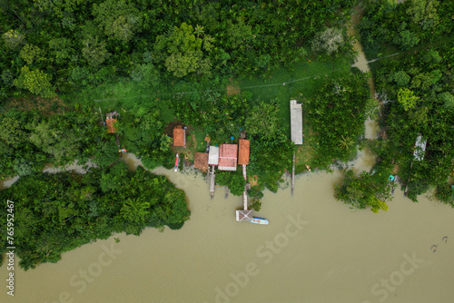 Aerial View of a Small Community Houses in Tropical Rainforest by the River Near Belem City in North of Brazil