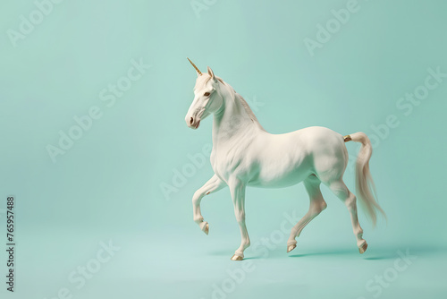 Beautiful white unicorn  isolated on pastel blue background  creative copy space.