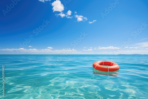 Lifebuoy on clear blue sea
