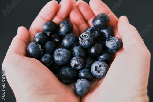 A handfull of fresh blueberries photo