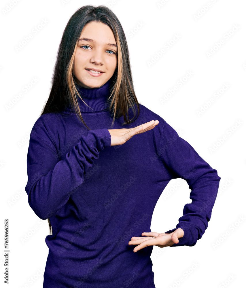 Young brunette girl with long hair wearing turtleneck sweater gesturing with hands showing big and large size sign, measure symbol. smiling looking at the camera. measuring concept. Young brunette girl with long hair wearing turtleneck sweater gesturing with hands showing big and large size sign, measure symbol. smiling looking at the camera. measuring concept.