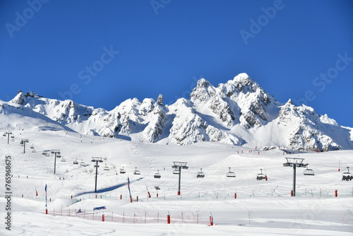 Ski slopes of French alps by winter 