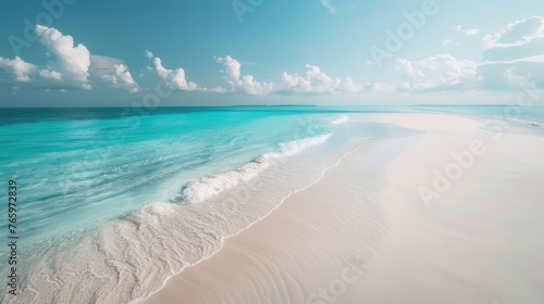 A serene beach scene, with white sand and turquoise waters stretching out to the horizon