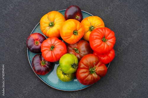 Bowl of colorful heirloom tomatoes in Provence, France © eqroy