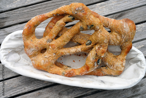 Fougasse bread with olives in Provence, France © eqroy