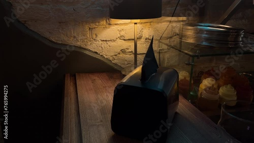 Girl scatters napkins in the black holder