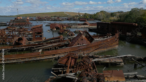 Remains of ship vessels disintegrating in harbor
