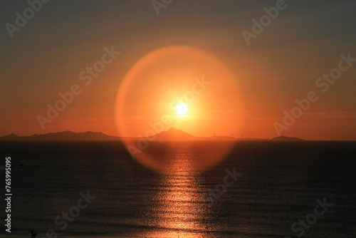 an intense sunrise against the sea © FotoHank