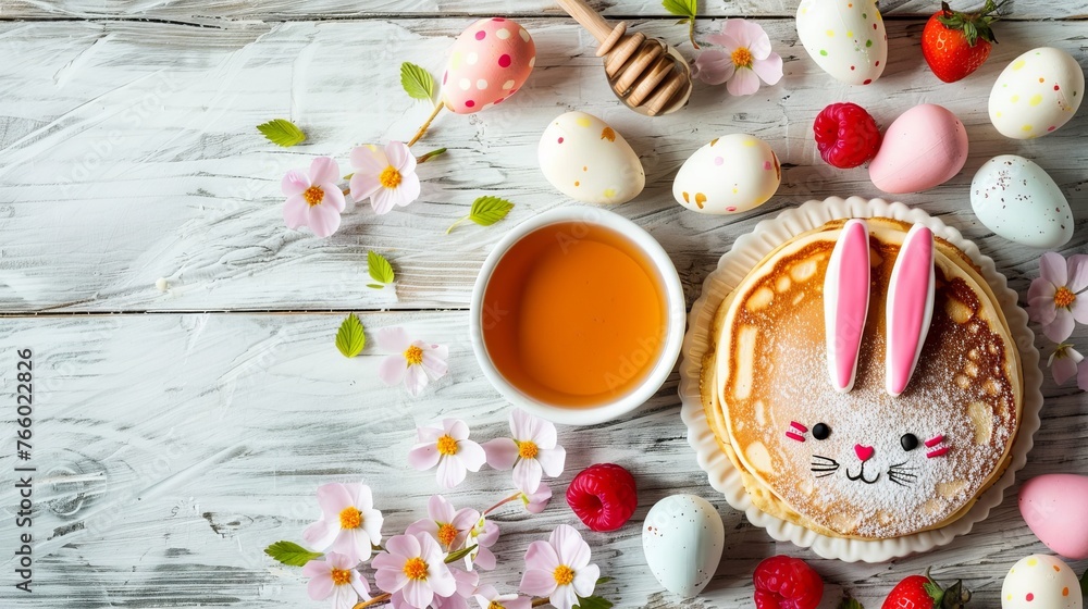 Easter bunny pancake breakfast with berries, honey, and pastel eggs on wooden background Easter bunny pancake breakfast with berries, honey, and pastel eggs on wooden background