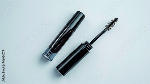 Isolated eyebrow styling gel against a white background. Oil for care. Cosmetic item for eyelash and eyebrow maintenance. The clear gel. a set of brush-equipped open and closed tubes.
