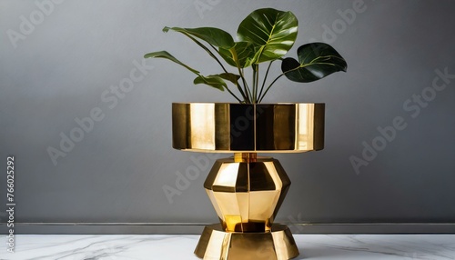 modern living room with plant.a sleek and modern gold metal plant stand with a complementary flower pot holder, featuring clean and angular silhouettes accented by polished finishes, creating a contem photo