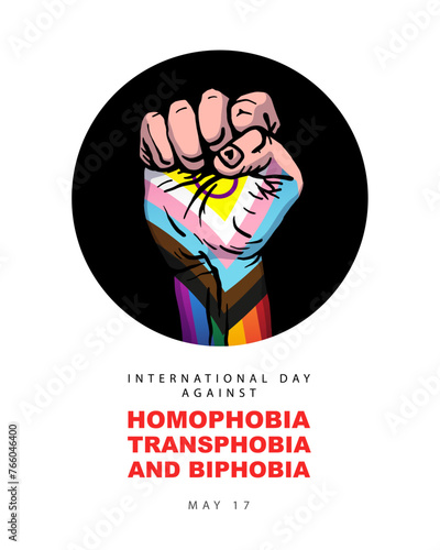 Human hand clenched into a fist in the colors of the LGBT flag. May 17 - the International Day against Homophobia