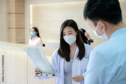 A doctor at the clinic prov...