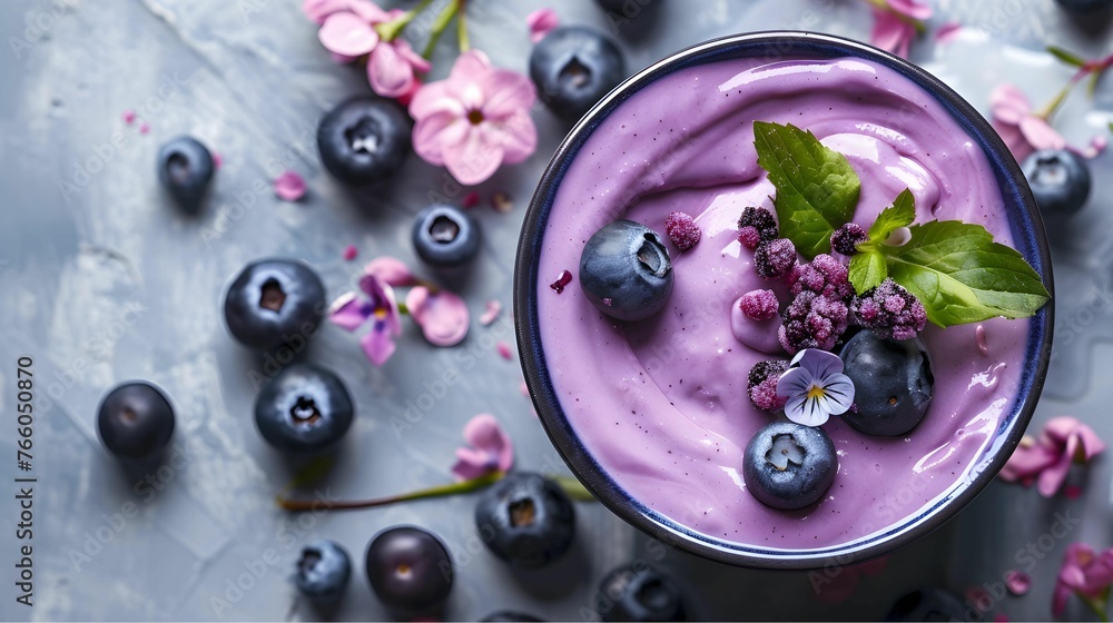 Close up of a blueberry smoothie on up fresh blueberry, summer drink concept Close up of a blueberry smoothie on up fresh blueberry, summer drink concept