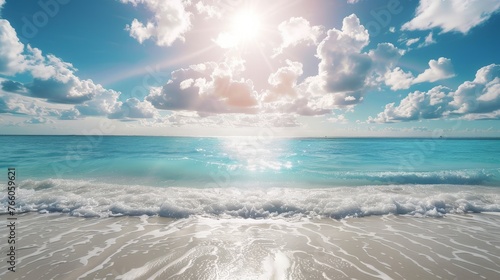 A summer vacation, holiday background of a tropical beach and blue sea and white clouds with sun flare. photo
