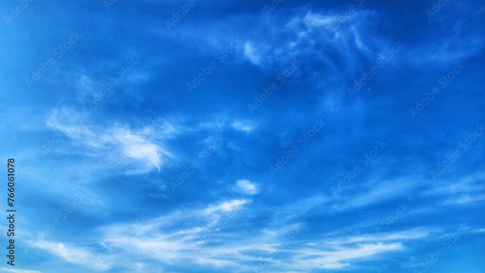 Fototapeta premium Blue sky background with white clouds. Sky background with white clouds.