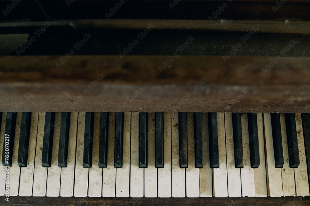 Old dirty piano keys in an abandoned church. Bay of Plenty, New Zealand. Old dirty piano keys in an abandoned church. Bay of Plenty, New Zealand.