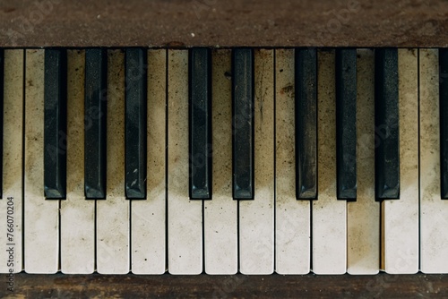 Bild auf Leinwand Old dirty piano keys in an abandoned church