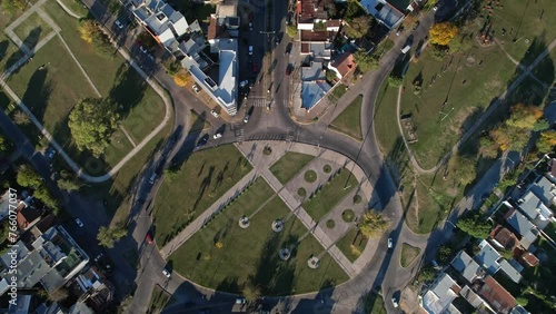 Buenos Aires City Traffic Roundabout Avenue Skyline, Aerial Revealing Tilt 
