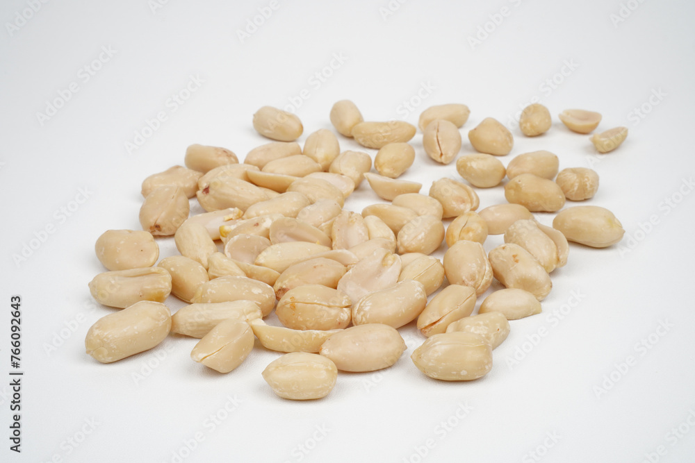 Group of roasted peeled peanuts isolated background Group of roasted peeled peanuts isolated background