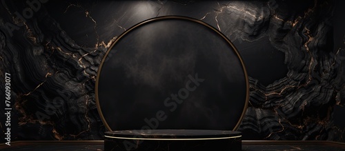 A podium is illuminated in the center of a dimly lit room, surrounded by automotive tires, electronic devices, and a window looking out onto a tree