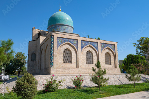 Ancient mausoleum of Kaffal Shashi on a sunny day. Religious complex of Hazrati Imam. Tashkent, Uzbekistan photo