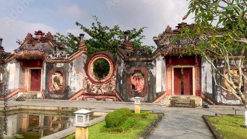 A garden with a pond. A pond in the center of Hoi An ancient town. UNESCO World Heritage site. Hoi An, Vietnam.