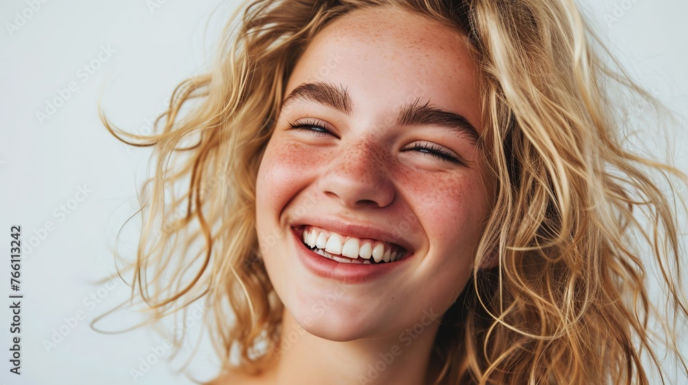 beautiful picture of a blond woman who is grinning and smiling beautiful picture of a blond woman who is grinning and smiling