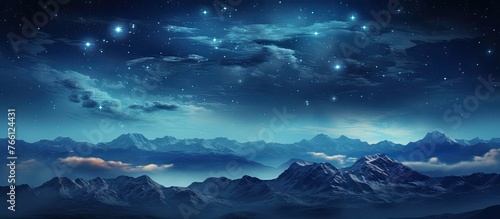 A breathtaking natural landscape with mountains in the foreground under a starry night sky filled with numerous twinkling stars