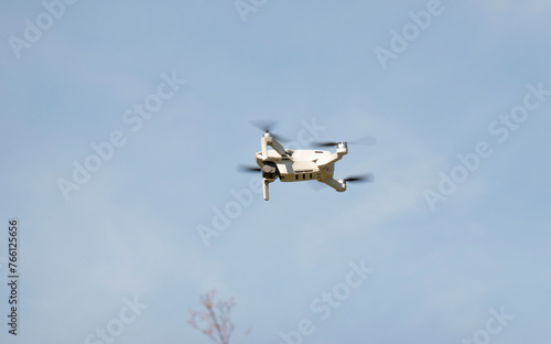 Fototapeta Naklejka Na Ścianę i Meble -  Remotely controlled drone with camera system in full operation