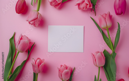 Elegant Red Tulips with Blank White Card on Pink Background