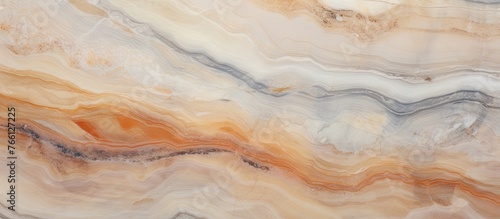 A closeup of a hardwood flooring with a swirl pattern resembling a marble texture. The natural material of the wood creates a beautiful and unique peachcolored pattern, resembling art and painting
