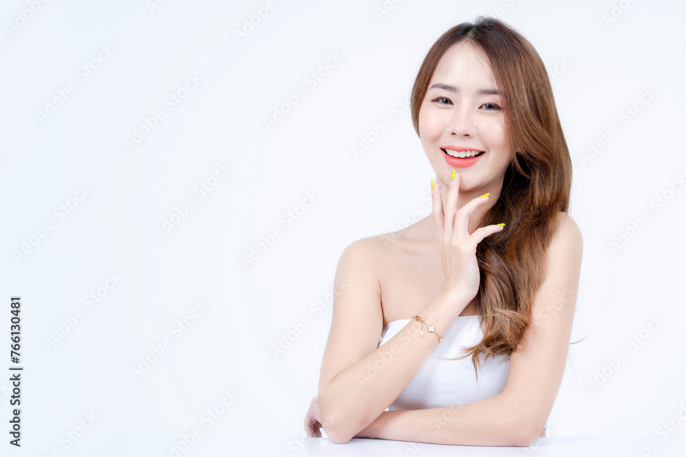 Asian woman with white strapless, Skincare and Cosmetology concept with white background, Free space for text, medium shot.
Asian woman with white strapless, Skincare and Cosmetology concept with white background, Free space for text, medium shot.
