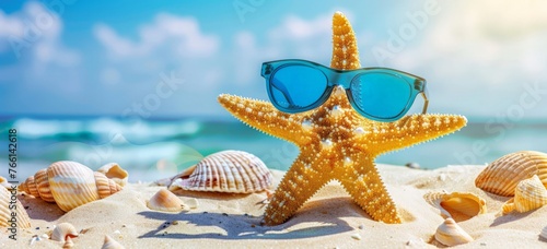 A starfish with sunglasses resting on the sandy beach