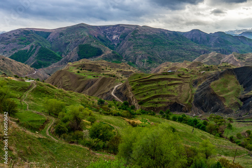 Beautiful spring landscape with mountain valley and hills in mountainous area. Green mountainsides on evening. Chokh terraces, urban and natural landmark of Dagestan republic, Russia. Amazing nature