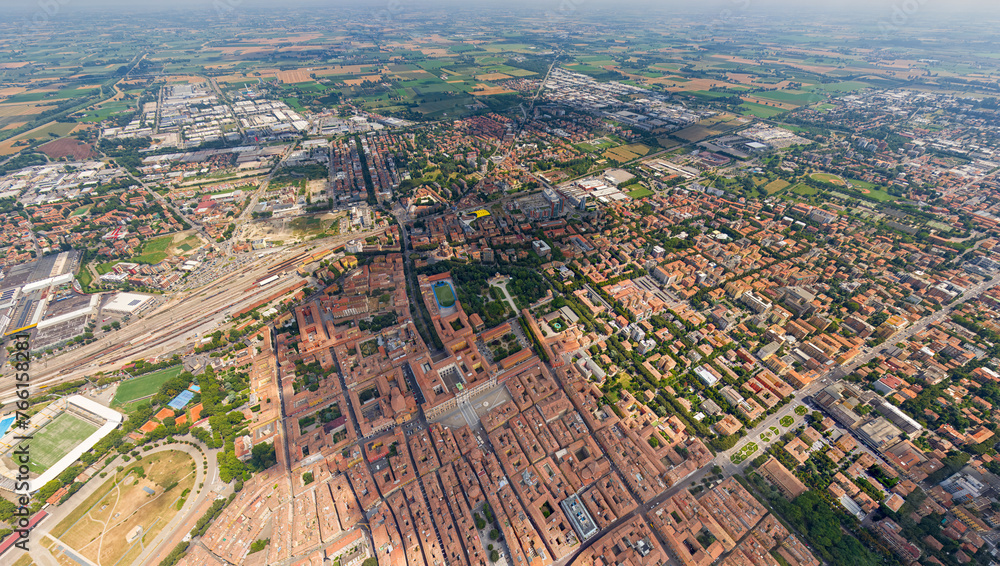 Modena, Italy. Historical Center. Panorama of the city on a summer day. Sunny weather with clouds. Aerial view